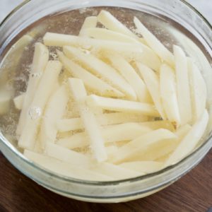 Soak French fries in cold water for at least 20 minutes