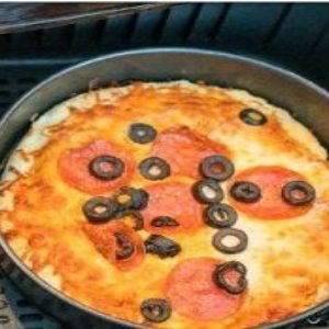 Spread sauce over dough