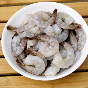 place shrimp into a bowl place shrimp into a bowl
